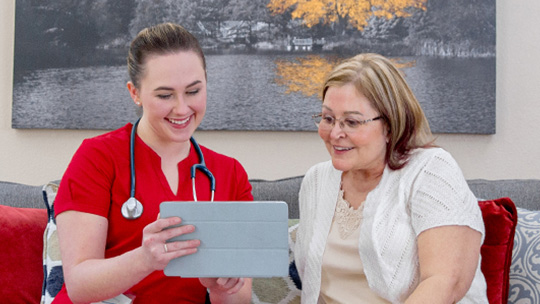 nurse helping patient