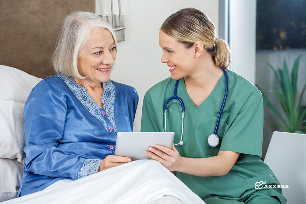 A nurse giving care to a patient at home