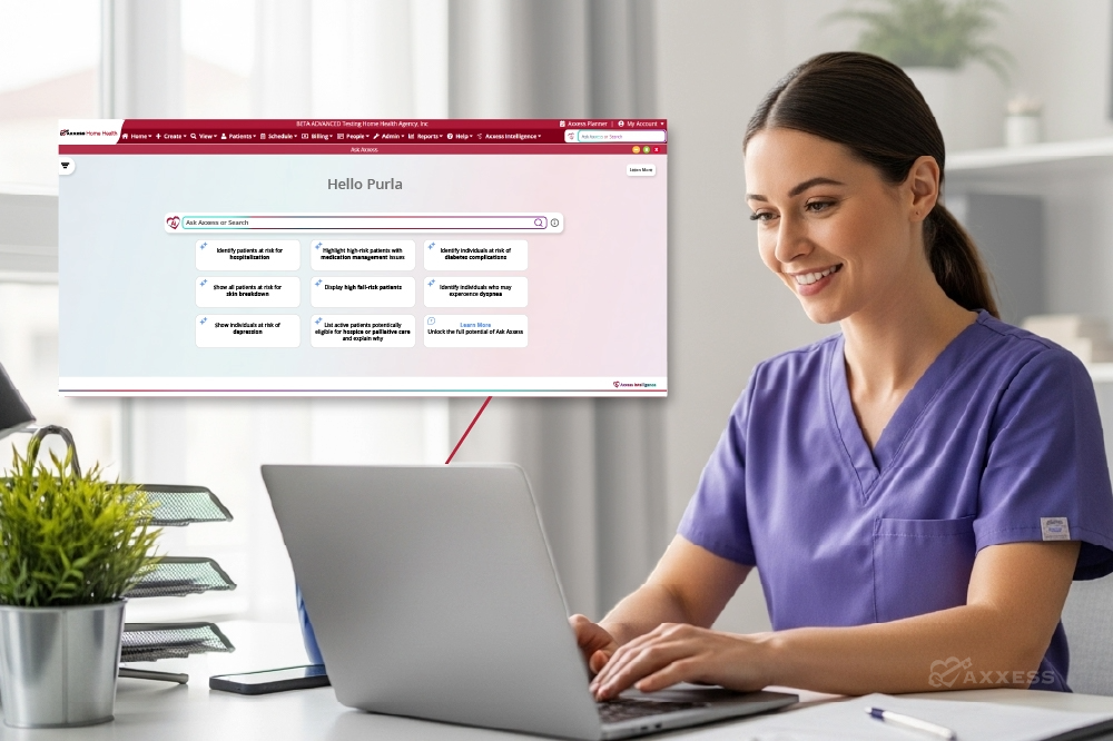 A healthcare professional in purple scrubs sits at a desk using a laptop displaying the Ask Axxess interface. The screen shows a search bar labeled &ldquo;Ask Axxess or Search&rdquo; and several options for identifying high‑risk patients, including risks for hospitalization, medication issues, diabetes complications, falls, depression, and hospice eligibility. A small plant, notebook, and file organizer are on the desk.